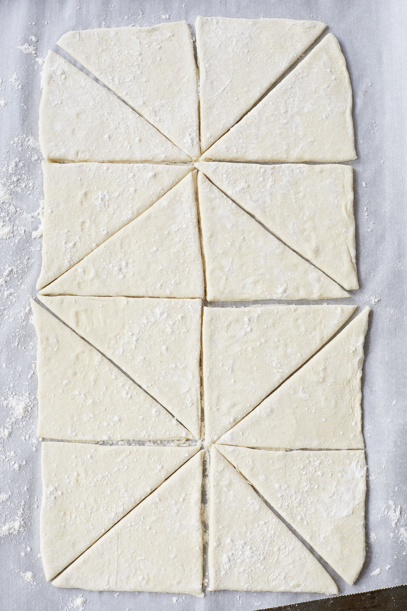 How to make the Rolls: Roll the prepared dough out into a big rectangular and cut it into 16 triangles,