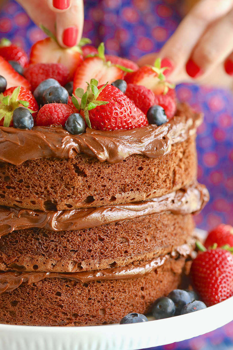 An easy chocolate cake with fruit on top.